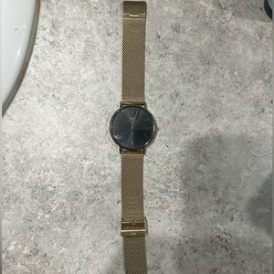 Daniel Wellington stainless steel Gold 40MM.